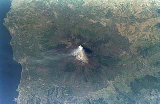 Earth observation views (volcano erupting) taken from shuttle Atlantis during STS-84 mission. 